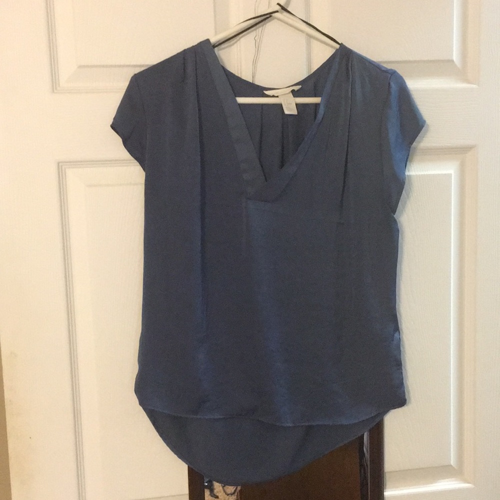 Chic blouse with a unique deep blue color.